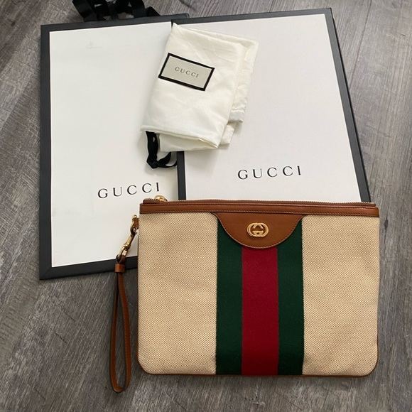 Gucci Handbags - GUCCI (authentic) clutch brand new
